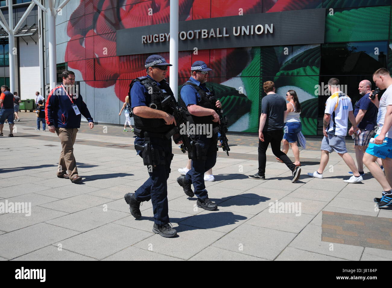 Armed police officers patrol outside the Aviva Premiership Rugby Final ...