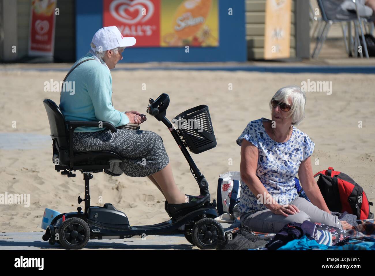 Weymouth, Dorset, UK. 26th May, 2017. Visitors enjoy Weymouth beach on what promises to be Dorsets hottest day of the bank holiday weekend . Credit: Tom Corban/Alamy Live News Stock Photo
