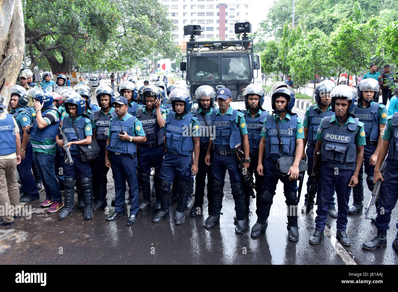 Dhaka, Bangladesh. 26th May, 2017.  Police have lobbed teargas shells and water canon to disband people protesting the removal of Lady Justice's statue from the Supreme Court premises, in Dhaka, Bangladesh, May 26, 2017. The statue was removed from its spot near the court's entrance on Thursday night, following demands by radical Islamist outfit Hifazat-e-Islam. Enraged by the decision, leftist student bodies began demonstrating outside the court premise and announced protests for the morning. Credit: SK Hasan Ali/Alamy Live News Stock Photo