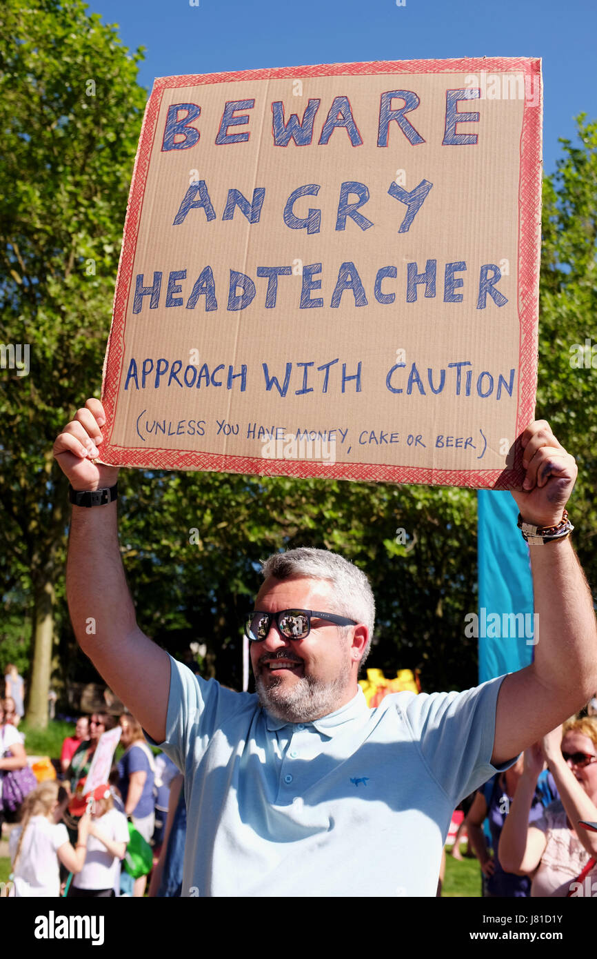 Brighton, UK. 26th May, 2017. Damien Jordan the head teacher of Fairlight School joins parents from Brighton and Hove schools as they take part in the 'Save Our Schools' (SOS) campaign protest rally at The Level in Brighton today against education cuts by the governement Credit: Simon Dack/Alamy Live News Stock Photo