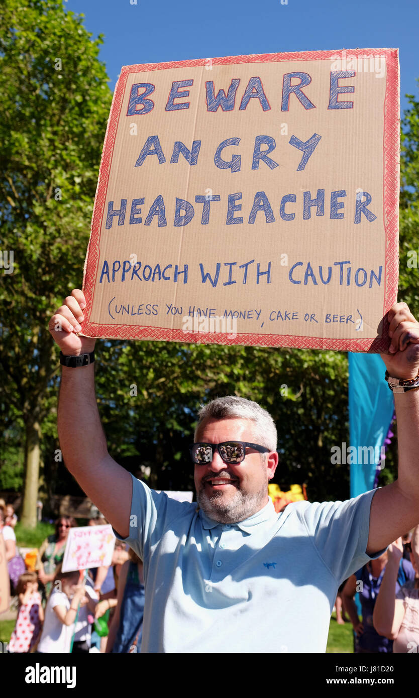 Brighton, UK. 26th May, 2017. Damien Jordan the head teacher of Fairlight School joins parents from Brighton and Hove schools as they take part in the 'Save Our Schools' (SOS) campaign protest rally at The Level in Brighton today against education cuts by the governement Credit: Simon Dack/Alamy Live News Stock Photo
