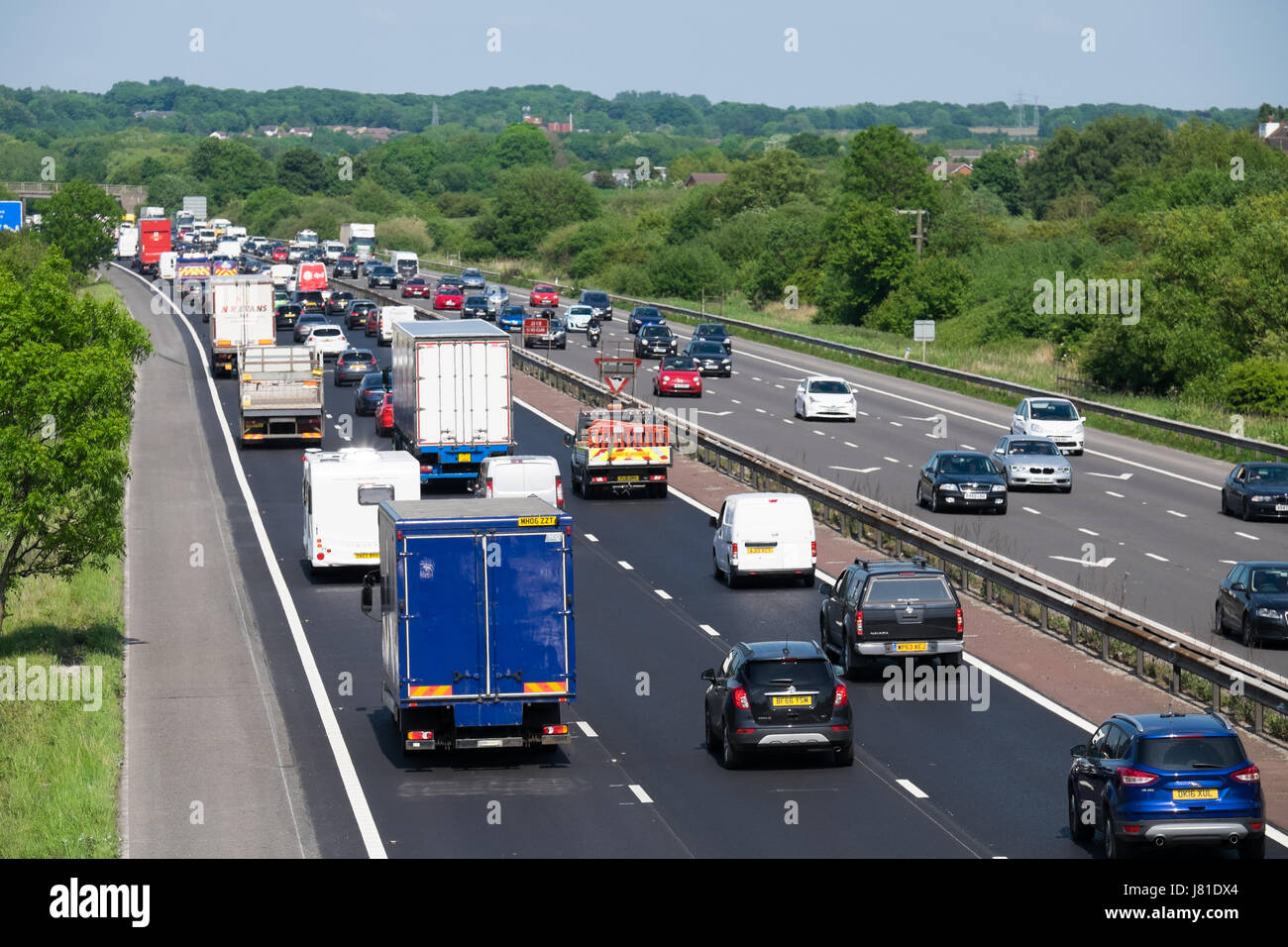 Cheshire, UK. 26th May, 2017. A busy M56 in Cheshire near Frodsham on Friday, May 26, 2017, as the Bank Holiday getaway begins. Credit: Christopher Middleton/Alamy Live News Stock Photo