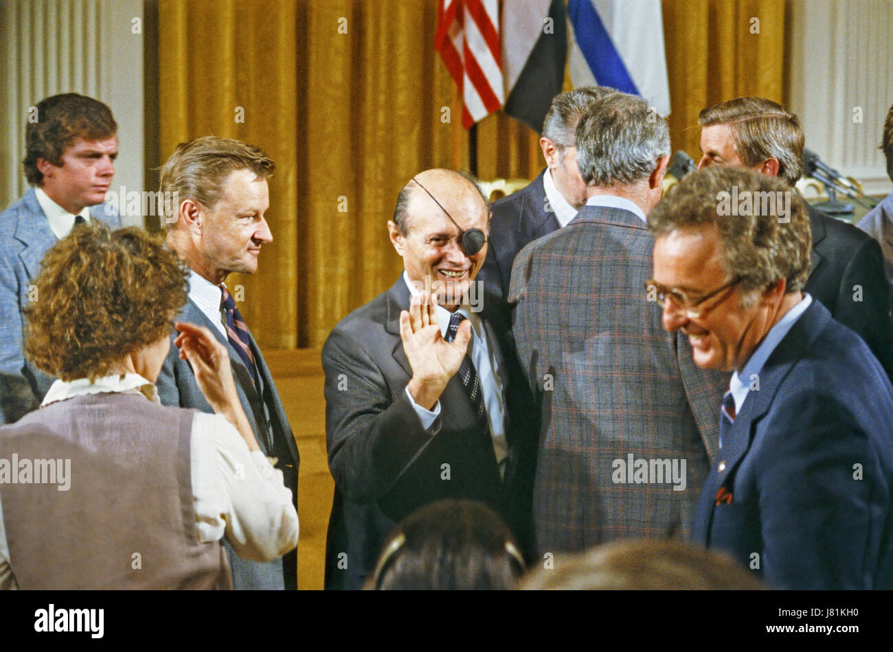 Foreign Minister Moshe Dayan of Israel waves to an unidentified person