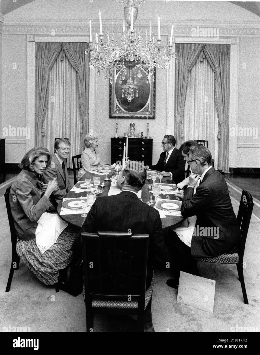 At dinner in the first floor dining room of the White House in Washington, DC, from left to right: Mrs. Nancy Kissinger, United States President Jimmy Carter, Mrs. Grace S. Vance, former US Secretary of State Dr. Henry A. Kissinger, first lady Rosalynn Carter, US Secretary of State Cyrus R. Vance and National Security Advisor Dr. Zbigniew K. Brzezinski on March 18, 1977. Credit: White House via CNP - NO WIRE SERVICE - Photo: White House/Consolidated/dpa Stock Photo