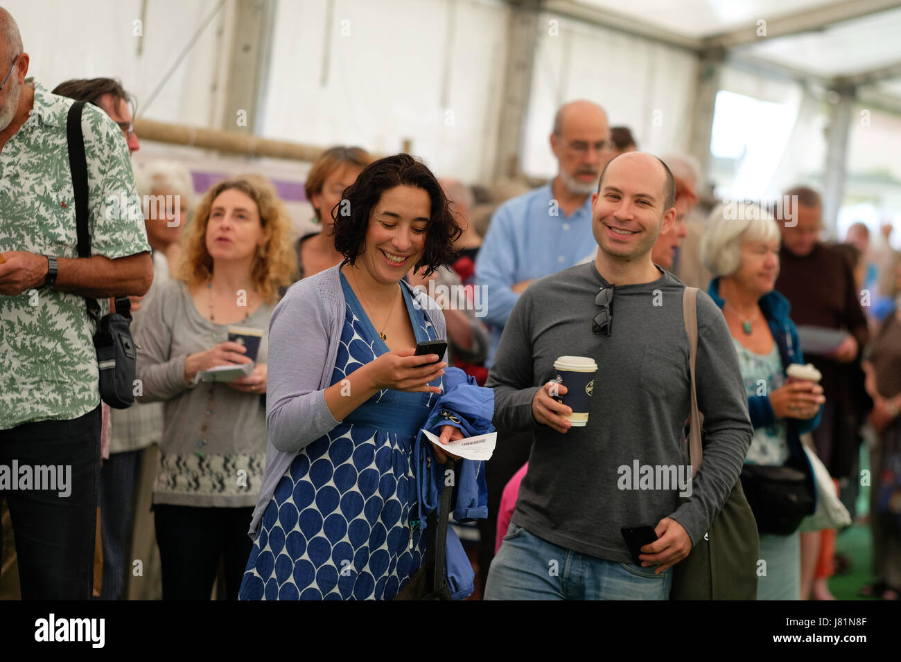 Hay Festival 2017 - Hay on Wye, Wales, UK - Saturday 27th May 2017 - Visitors wait for the stage to open to see the Egyptian novelist Ahdaf Soueif talking about her work This is Not a Border - the Hay Festival celebrates its 30th anniversary in 2017 - the literary festival runs until Sunday June 4th.  Steven May / Alamy Live News Stock Photo