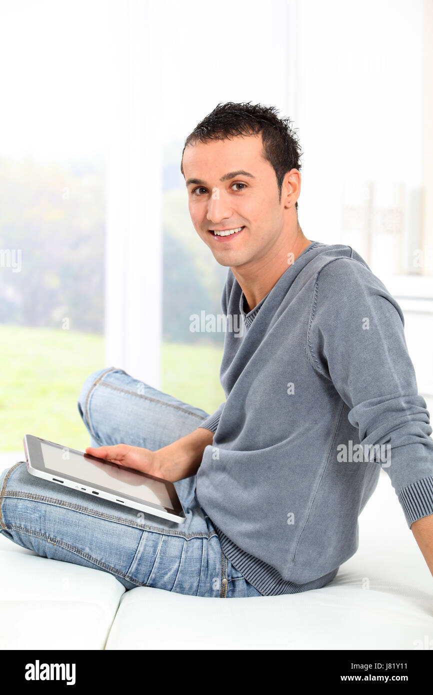 newspaper journal laptop notebook computers computer laugh laughs laughing twit Stock Photo