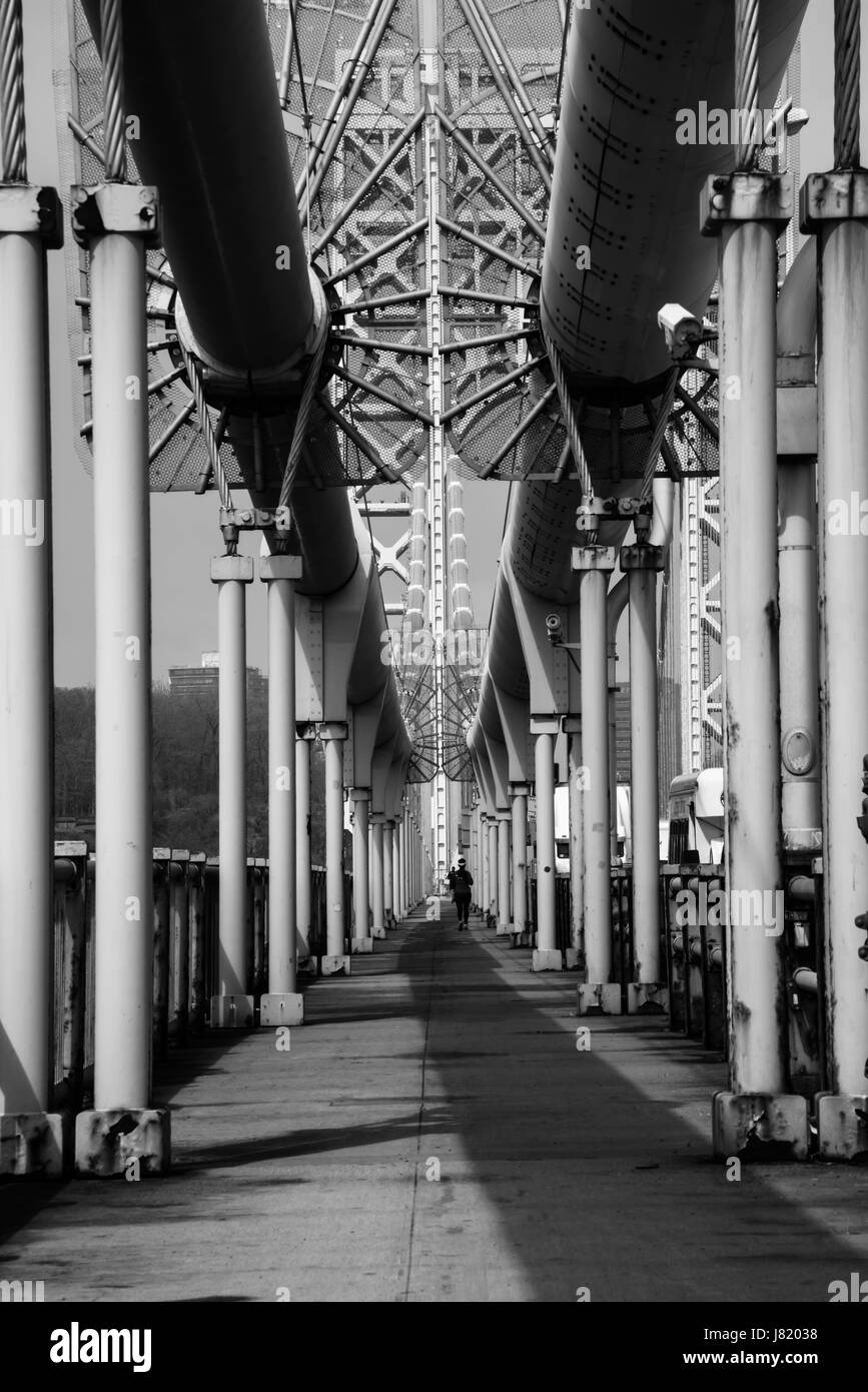 Walking through George Washington bridge in New York City Stock Photo