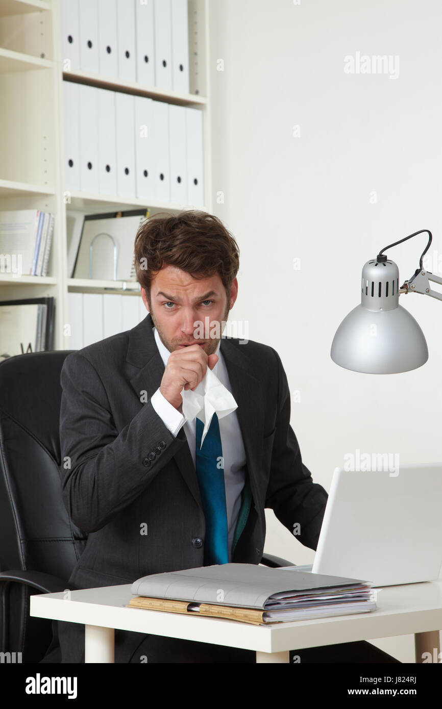 office desk cold catarrh sits work job labor sick ill workers laborer