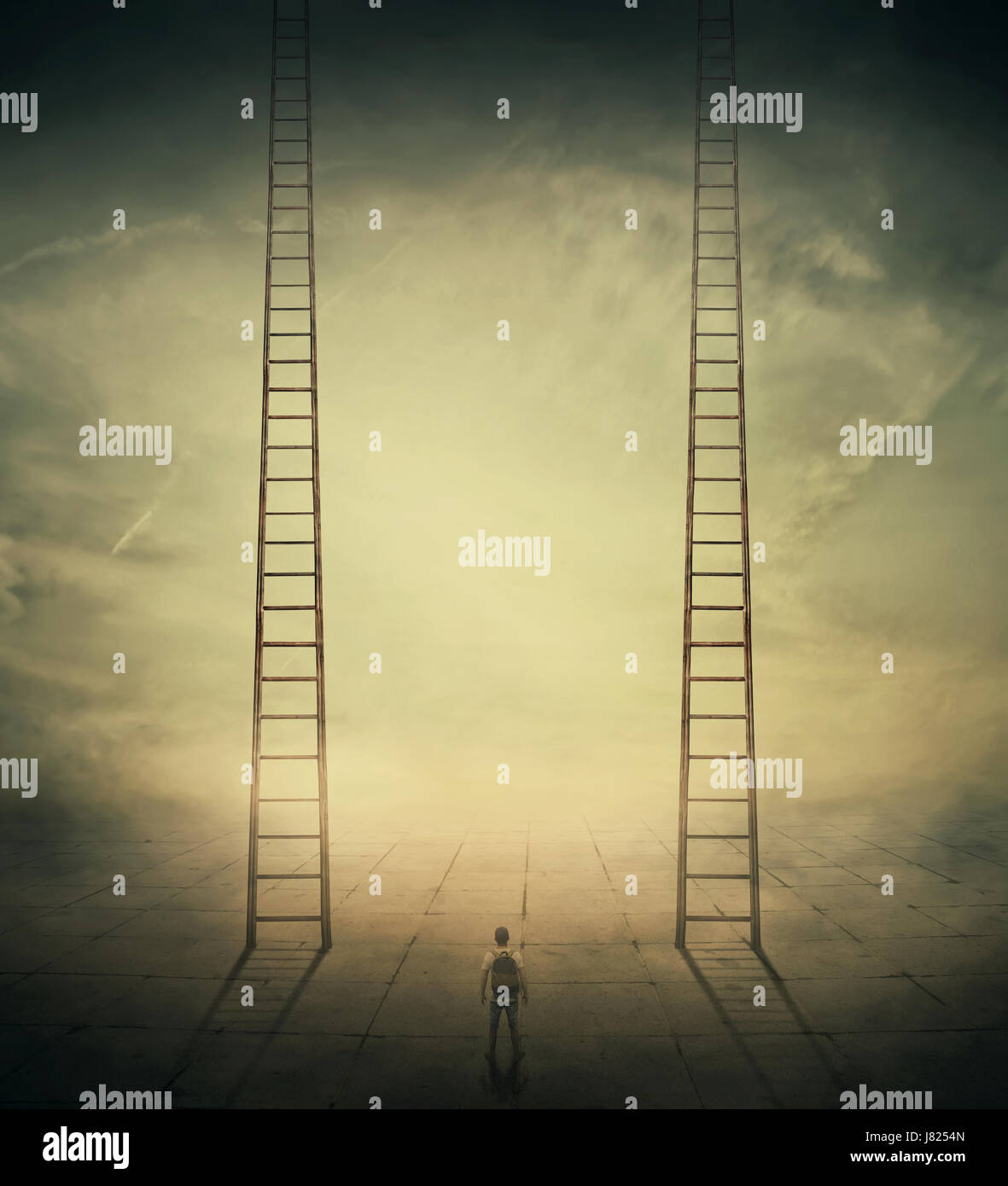 Surrealistic concept as a man standing in a foggy street looking at two stairways, thinking which to climb, choosing the correct way up. Different lif Stock Photo
