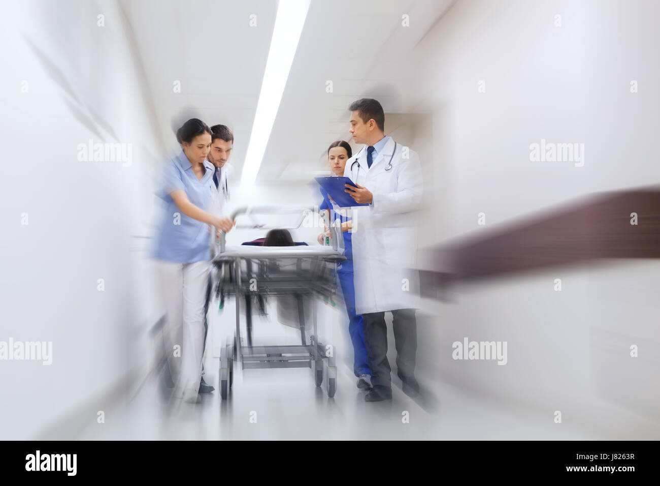 medics and patient on hospital gurney at emergency Stock Photo Alamy