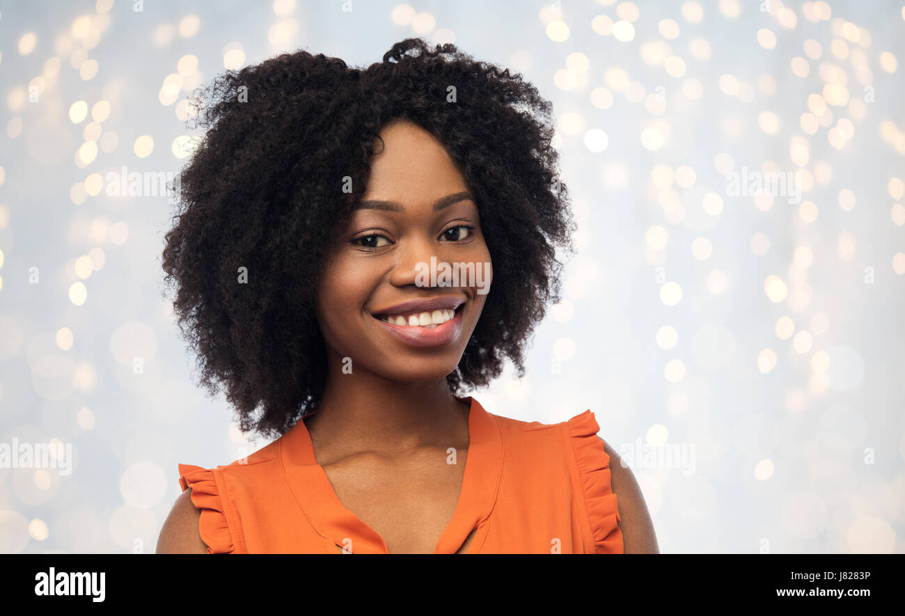 happy african american young woman over white Stock Photo - Alamy