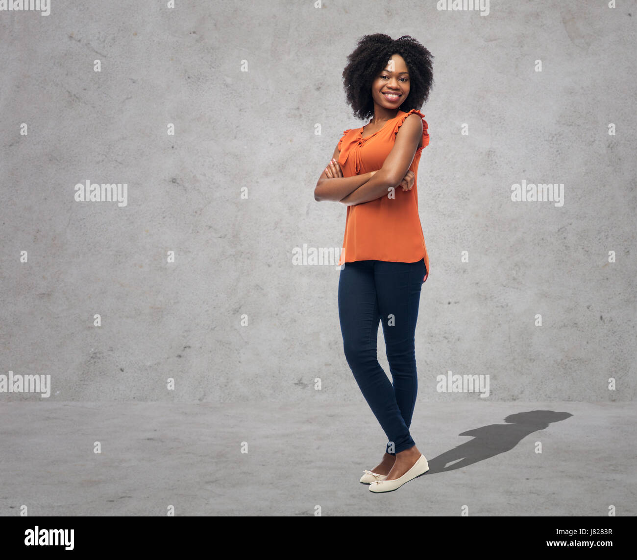happy african american young woman over white Stock Photo - Alamy