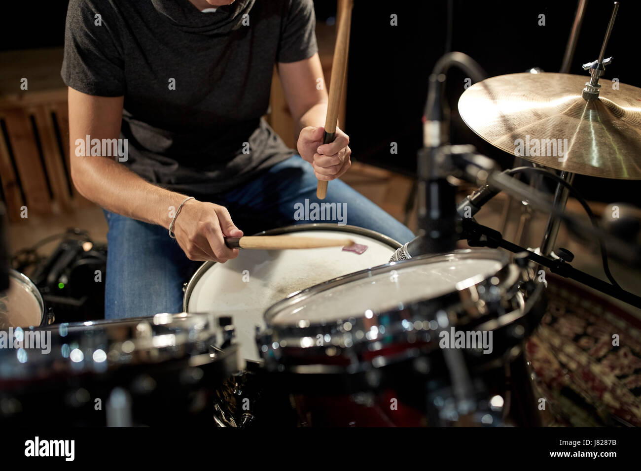 male musician playing drums and cymbals at concert Stock Photo Alamy