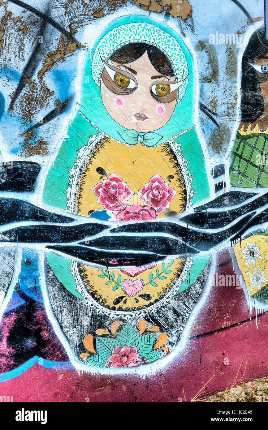 The work of street artist Femme Fatale frequents San José's city walls.  Her work tends to revolve around women’s rights.  This particular piece is pa Stock Photo