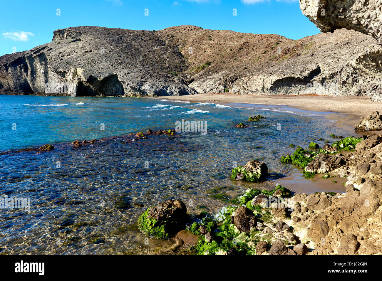 Volcanic rock-formations at Playa de Monsul. Famous beach in the Cabo de Gata-Nijar Natural Park. Province of Almeria. Spain Stock Photo