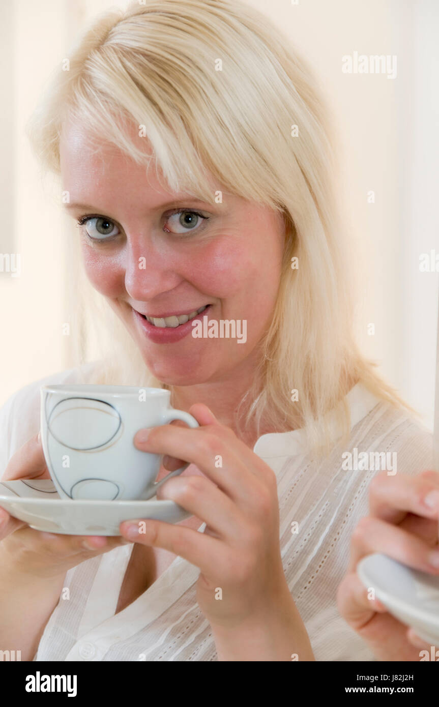 embarrassment look with cup Stock Photo