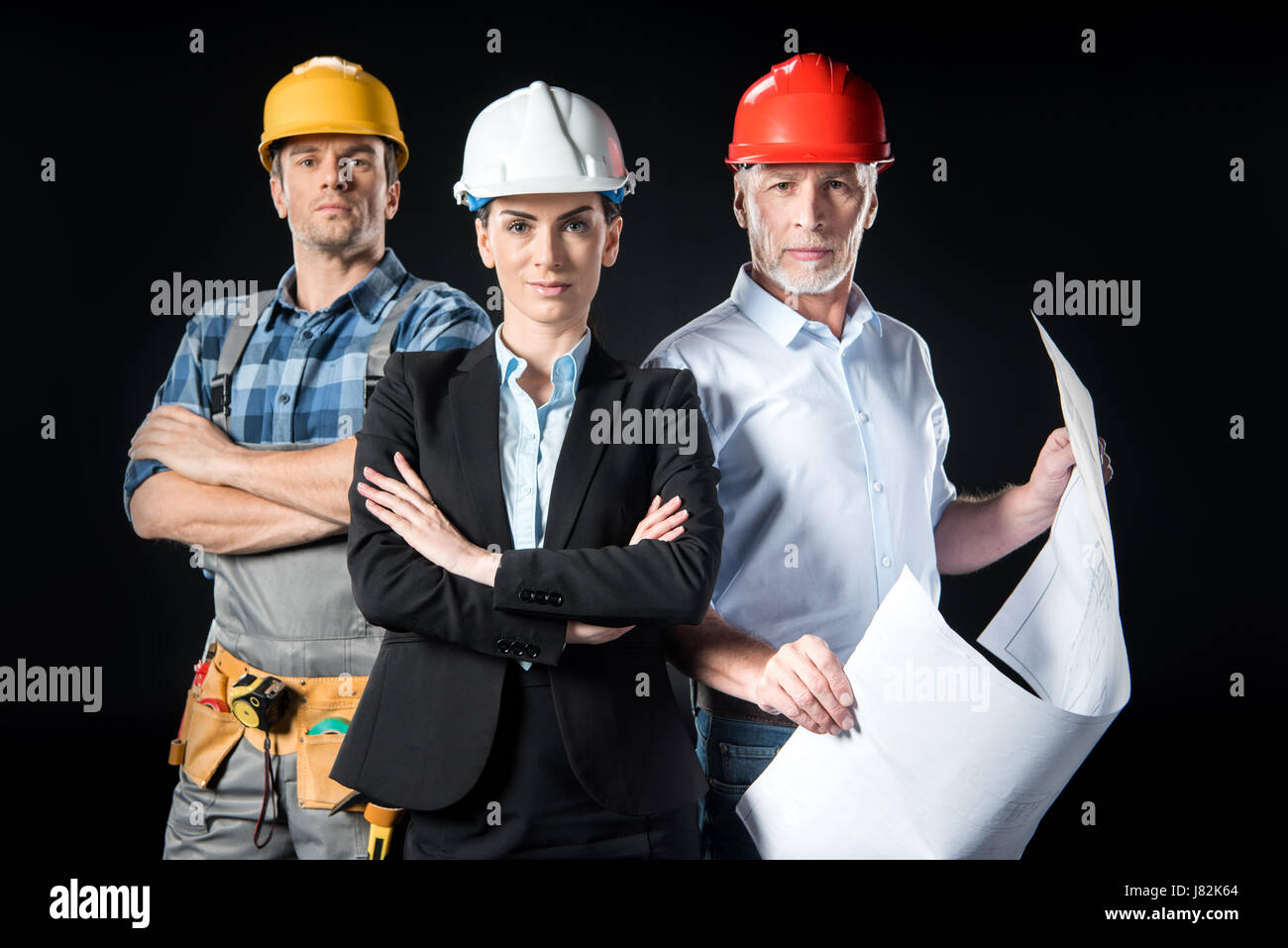 Workmen in hard hats hi-res stock photography and images - Alamy