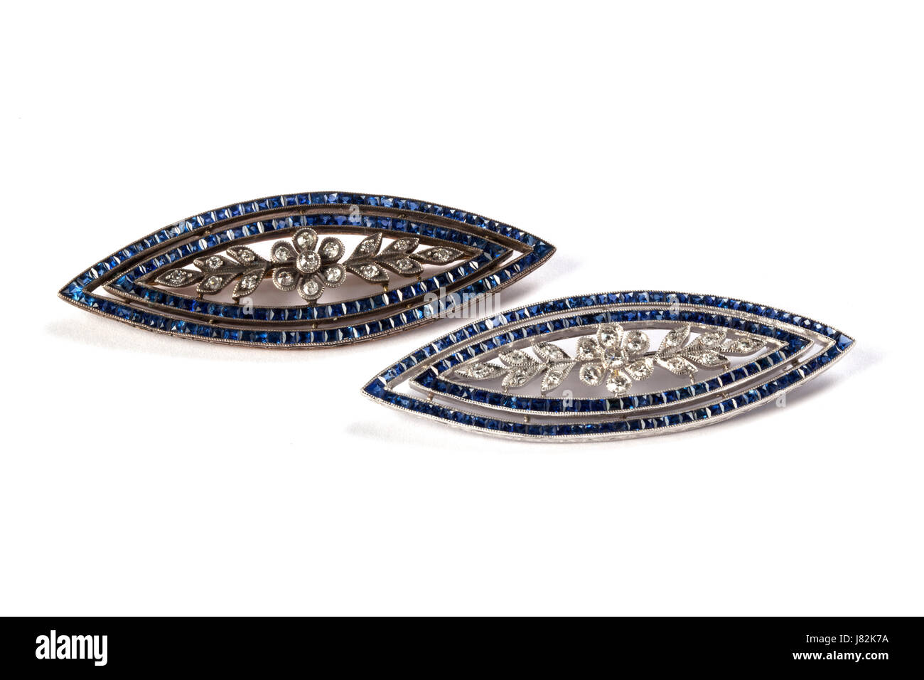 Sapphire and diamond navette shaped brooches. Valued at £2,500 each Stock Photo