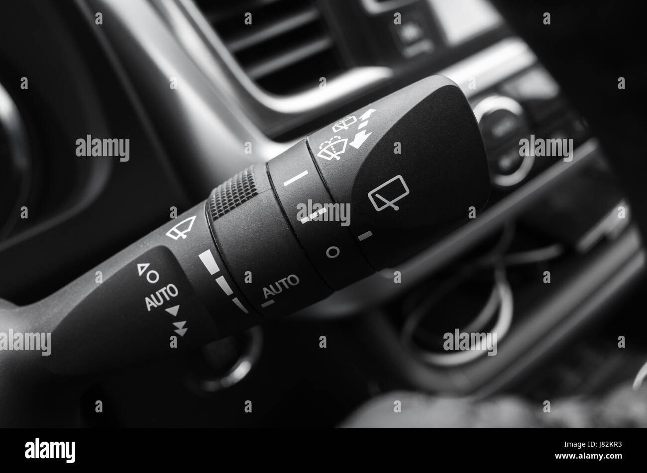 Multi functional wipers mode selector, modern car interior details. Close up photo with selective focus Stock Photo
