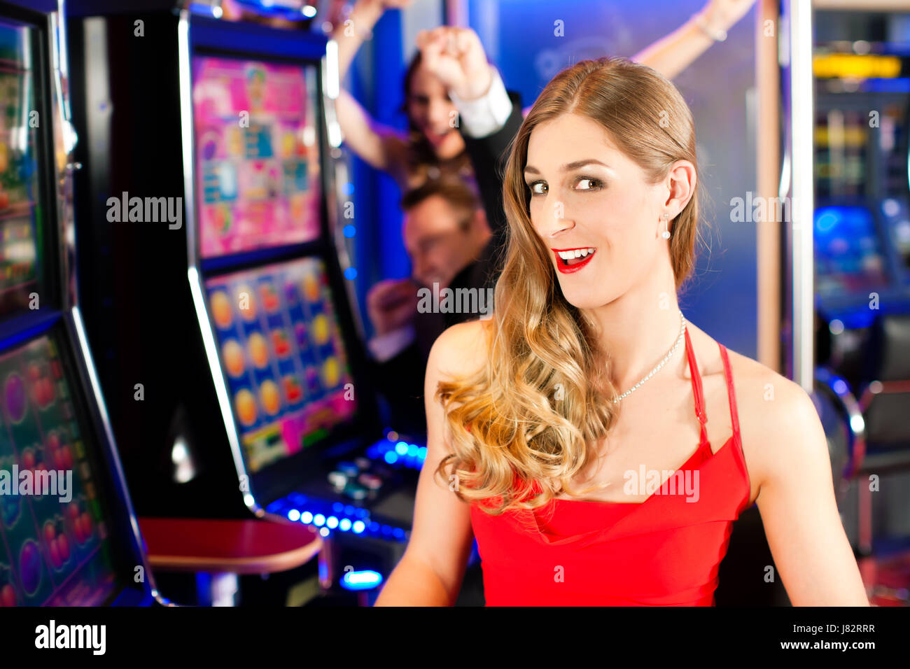 friends in casino Stock Photo