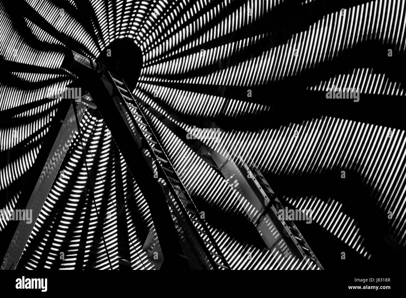 Ferris wheel in motion with  abstract patterns Stock Photo