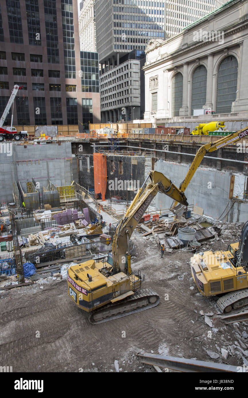 Preparing a deep foundation for another midtown tall building going up