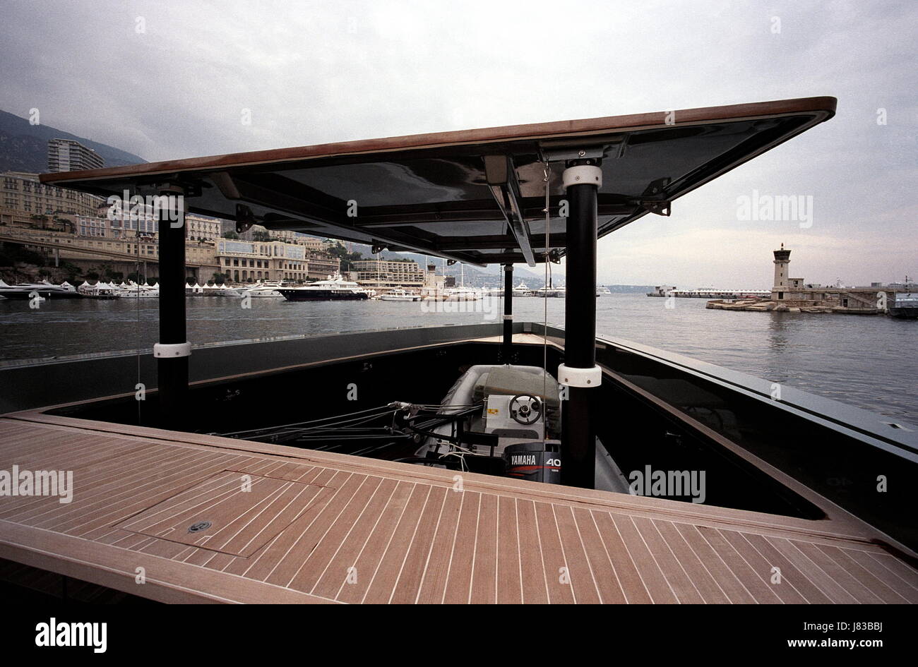 AJAXNETPHOTO. 28 SEPT 2003. MONTE CARLO, MONACO. - STEALTH BOMBER OR SUPER YACHT? - THE FRONT END OF THE NEW WALLY POWER 118 TRIPLE GAS TURBINE POWERED MOTOR YACHT.  PHOTO:JONATHAN EASTLAND/AJAX. REF:31009 5 Stock Photo