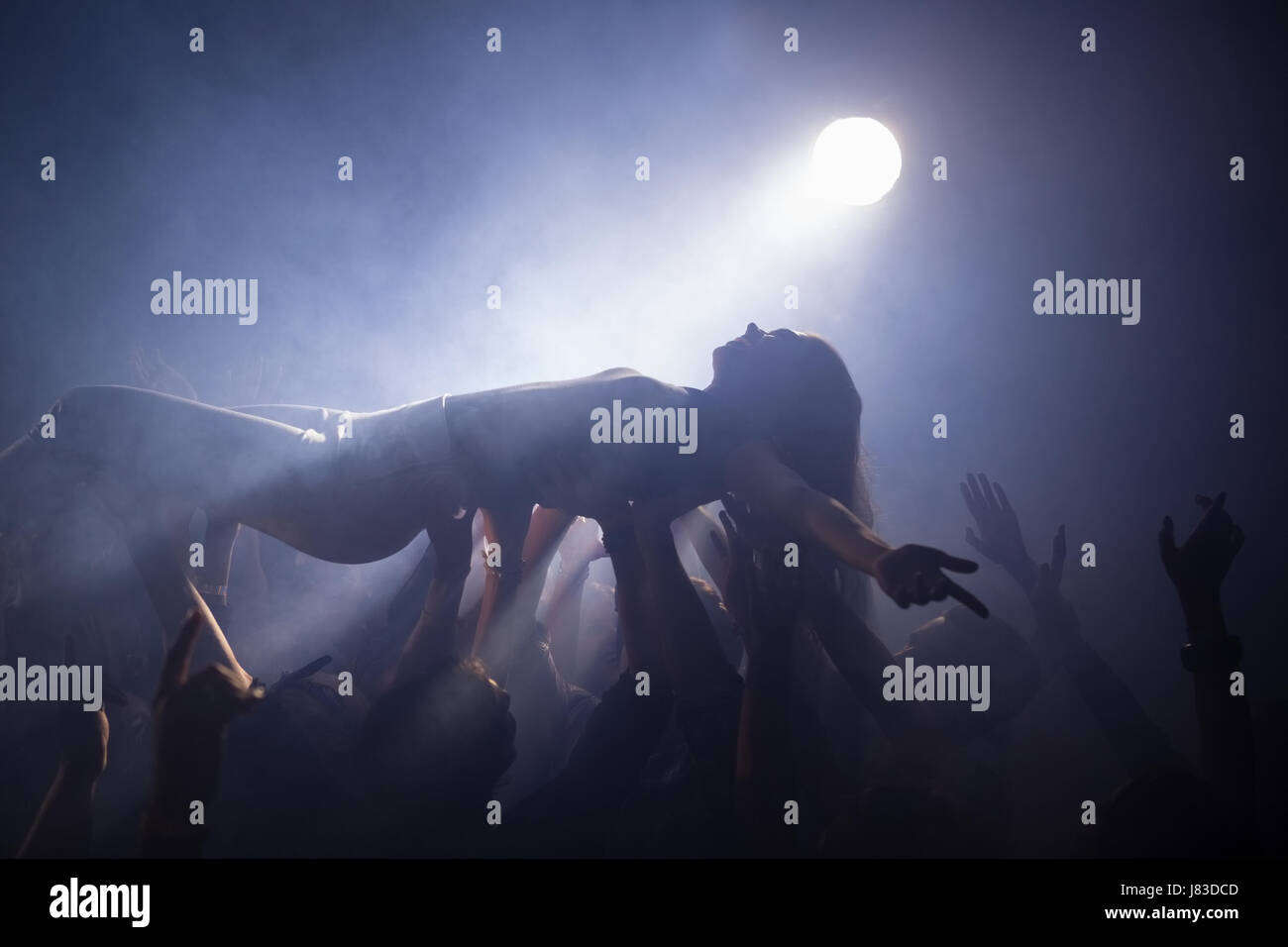 Crowd surfing at a concert in Stock Photo Alamy