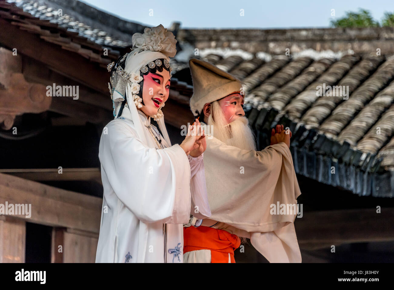 Chinese opera performers (Peking Opera or Kunqu style) at Cangpo Ancient Village outside of Wenzhou, in Yongjia County, Zhejiang Province, China. Stock Photo
