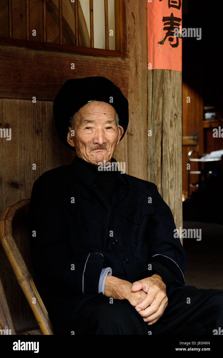 Elderly Chinese man living in Linkeng or Lingshang Renjia ancient village, Yongia County, the Nanxi River area known for longevity in China, province. Stock Photo