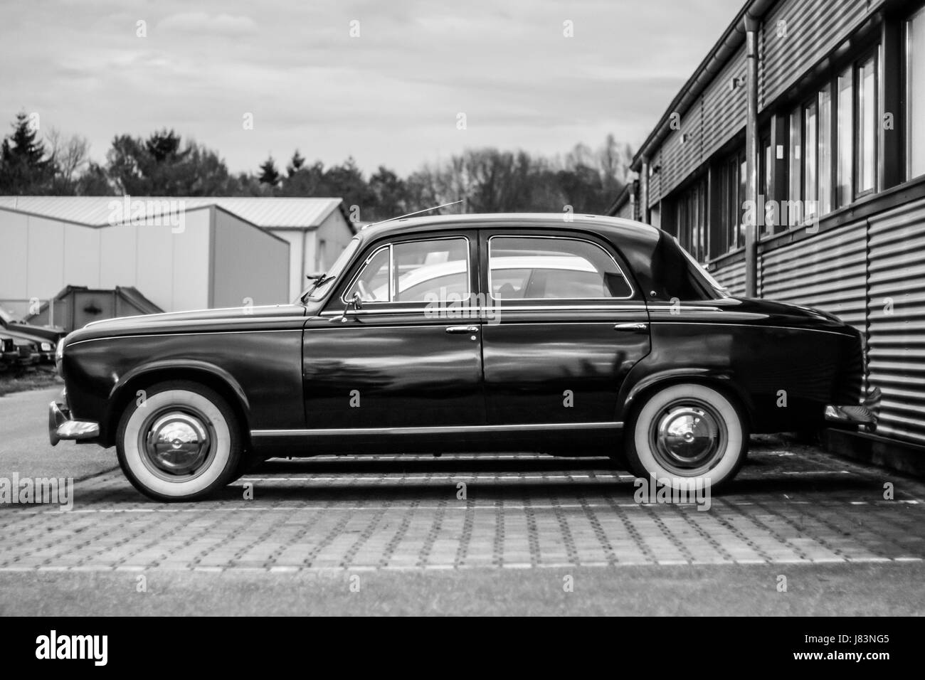 Very vintage old car on the parking lot Stock Photo - Alamy