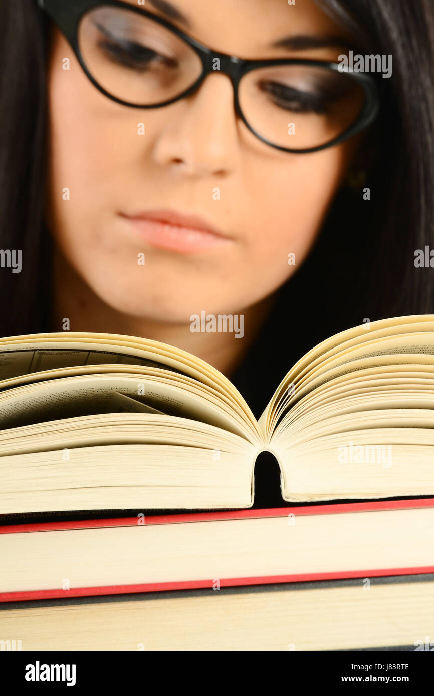 woman female spectacles glasses eyeglasses reading learning book school Stock Photo
