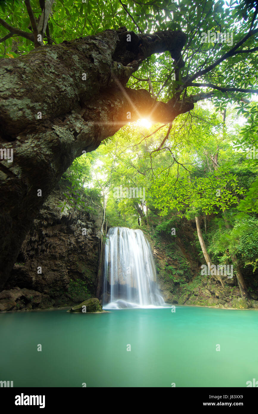 Erawan Waterfall is a beautiful waterfall in spring forest in Kanchanaburi province, Thailand. Stock Photo