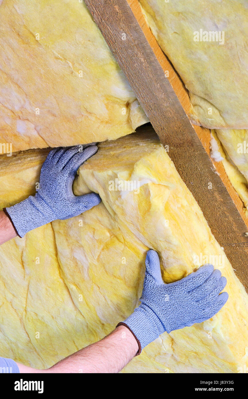 hand build glove roof beam repress rooftop hand build glove insulate insulation Stock Photo