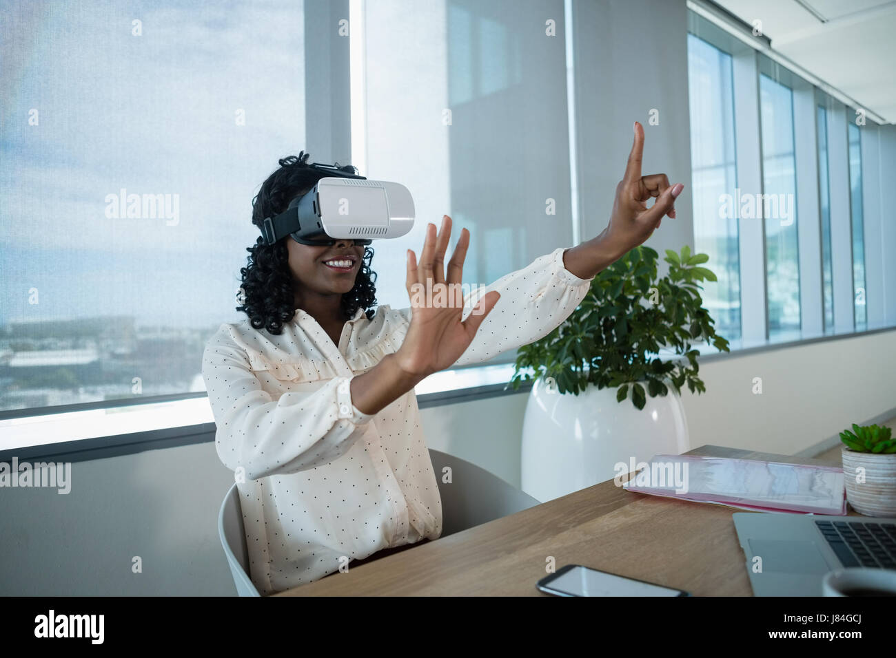 Desk wireless headset phone hi-res stock photography and images - Alamy