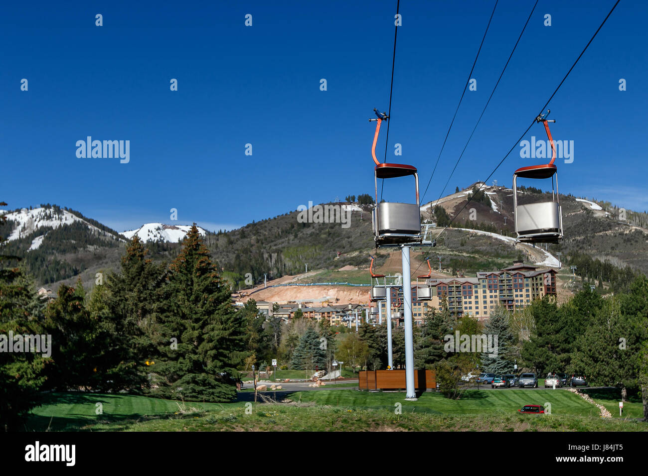Cable lift with its cabins in a ski resort. Stock Photo