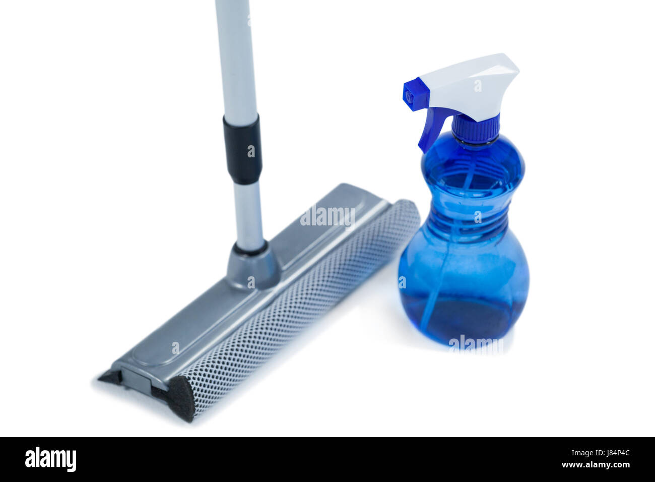 Squeegee mop with cleaning spray bottle on a white background Stock