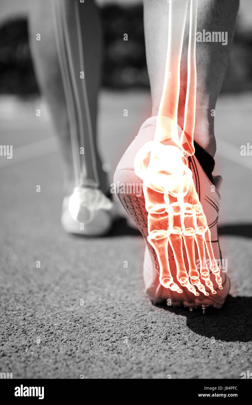 Digital composite of highlighted foot bones of jogging man Stock Photo