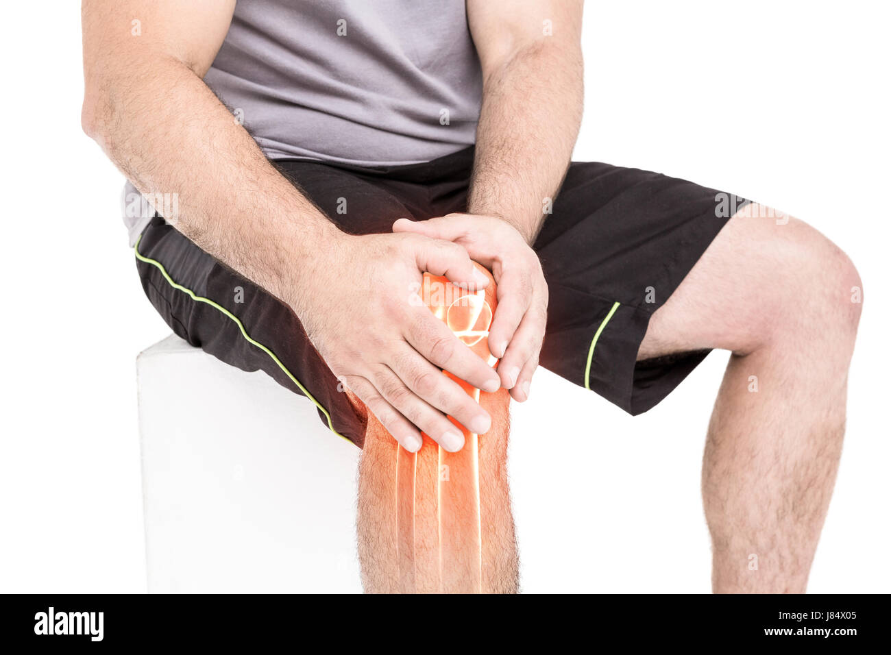 Digitally generated image of man suffering with knee inflammation against white background Stock Photo