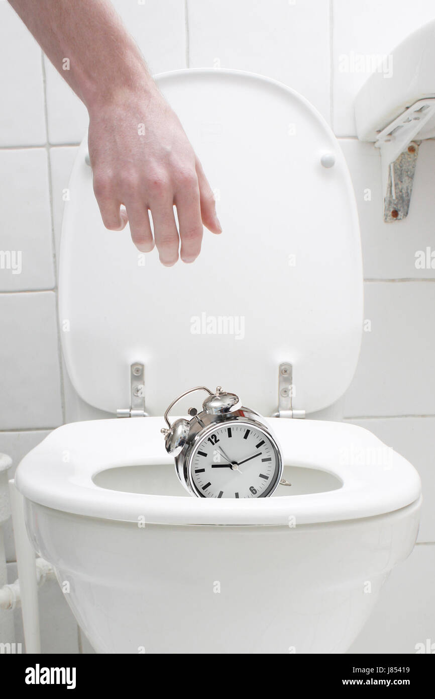 lose losing loosing clock date time time indication vertical out toilet