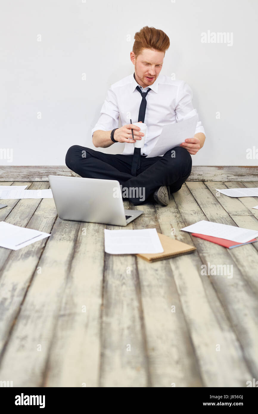 Reading cross legged on floor hi-res stock photography and images - Alamy