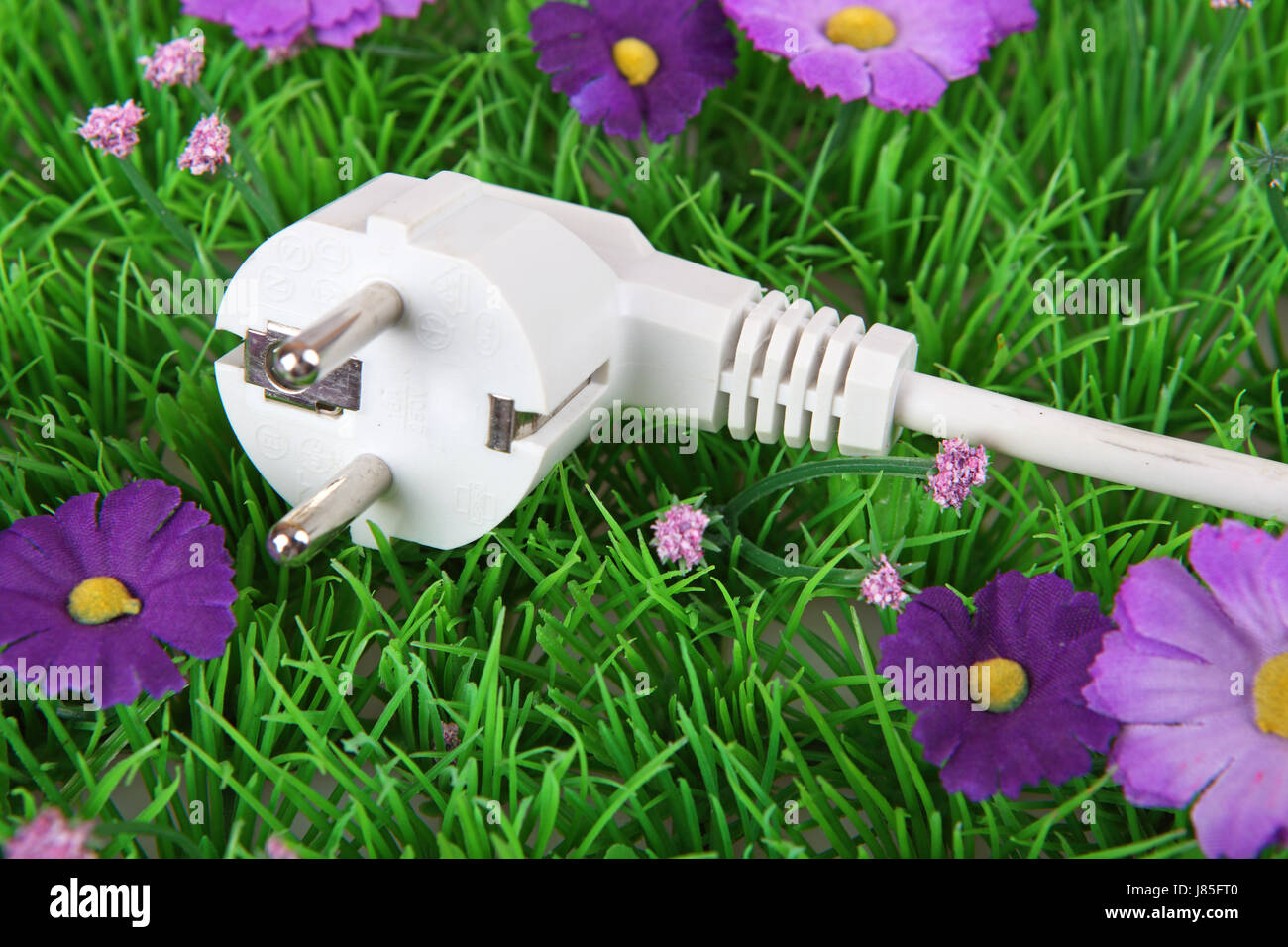 energy power electricity electric power plug alternative meadow power plug Stock Photo