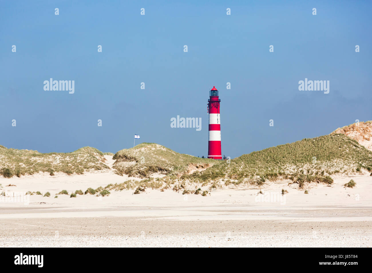 Sandy beach with lighthouse, Amrum, North Frisian Islands, Schleswig-Holstein, Germany Stock Photo