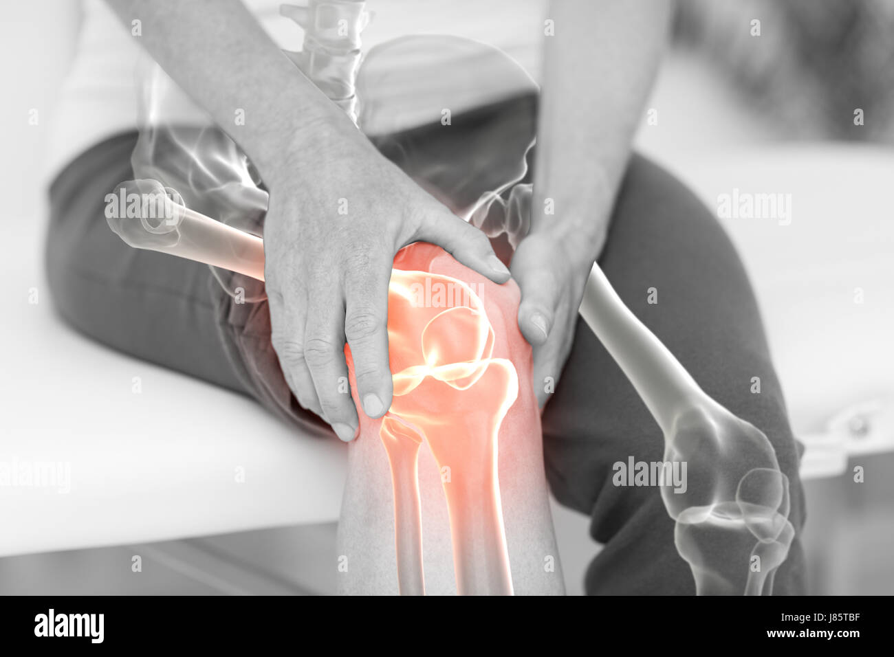Digitally generated image of man holding sore knee Stock Photo