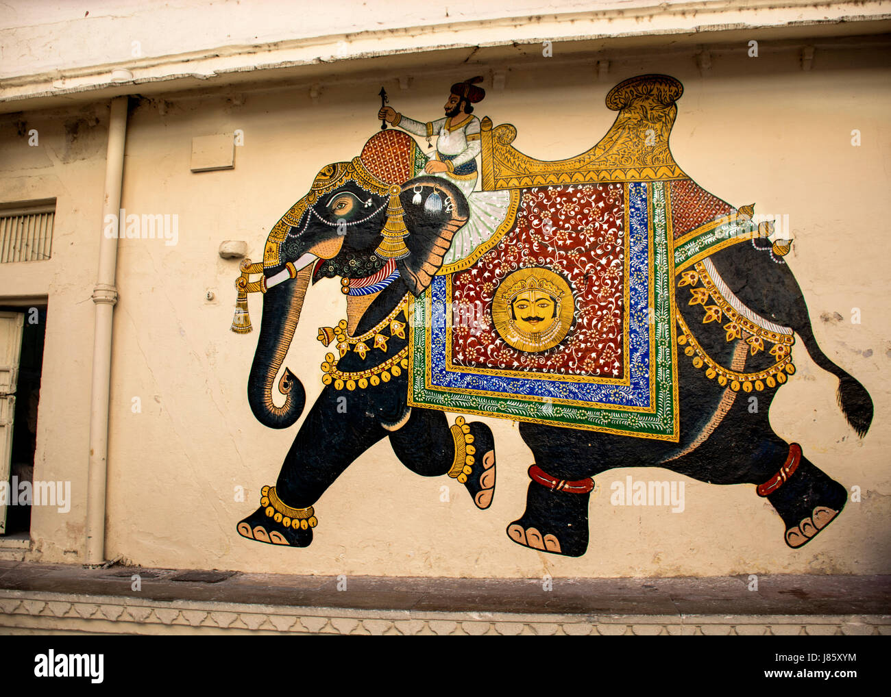 Wall painting on the wall of city palace udaipur Stock Photo