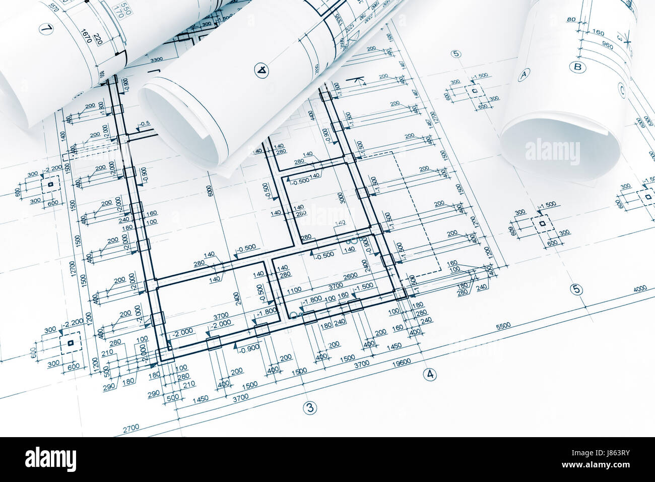 construction plan, rolls of technical blueprints. architectural background. Stock Photo