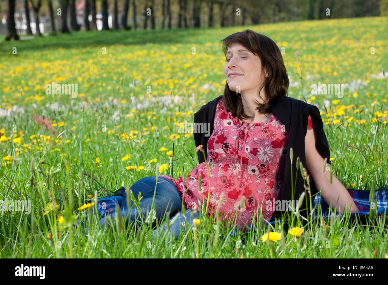 woman relaxation flower meadow careless young younger meadow girl girls woman Stock Photo