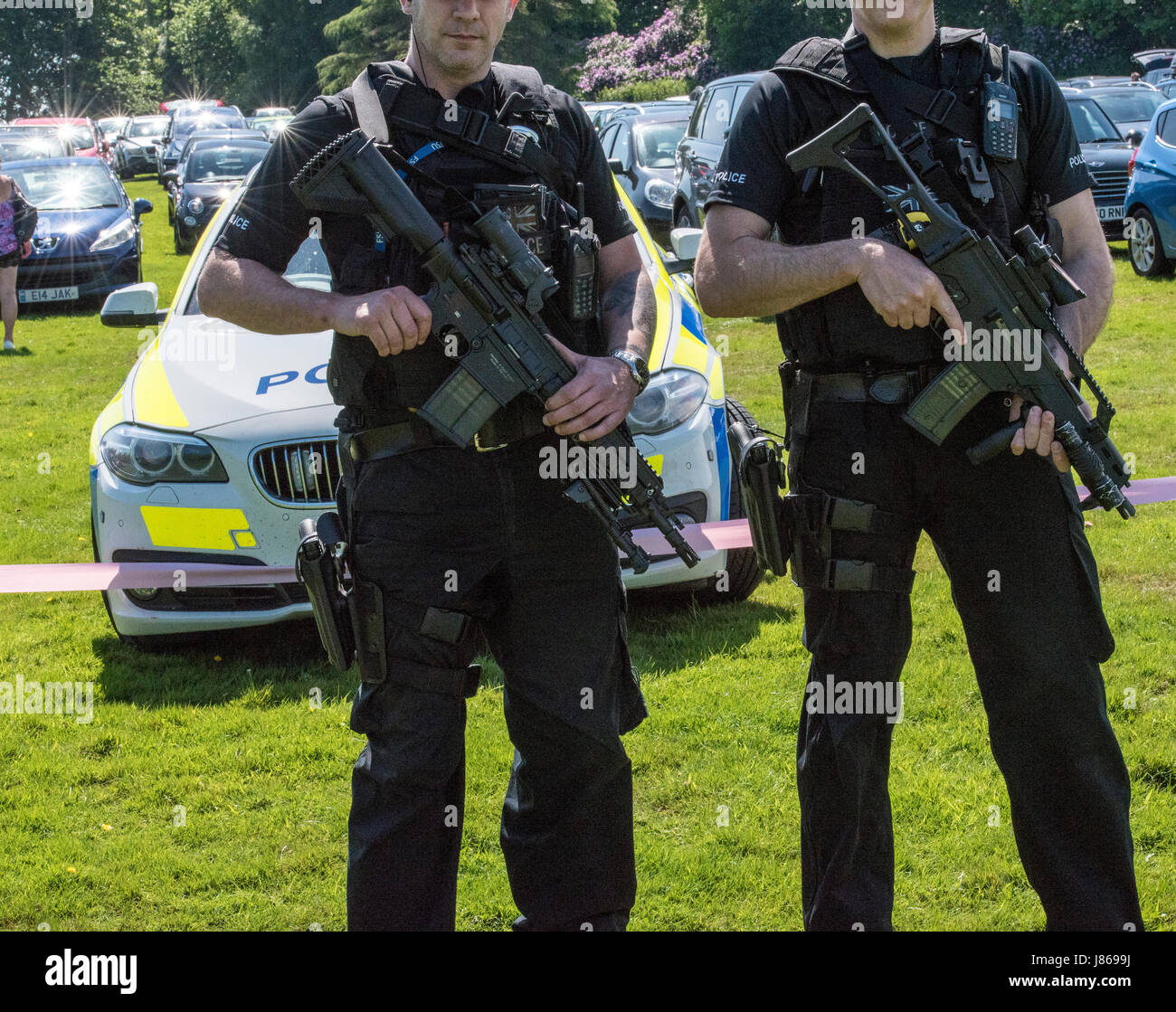 Brentwood, Essex, 27th May 2017 Armed police patrol Cancer Research Race for Life event in South Weald Park, Brentwood, Essex Credit: Ian Davidson/Alamy Live News Stock Photo