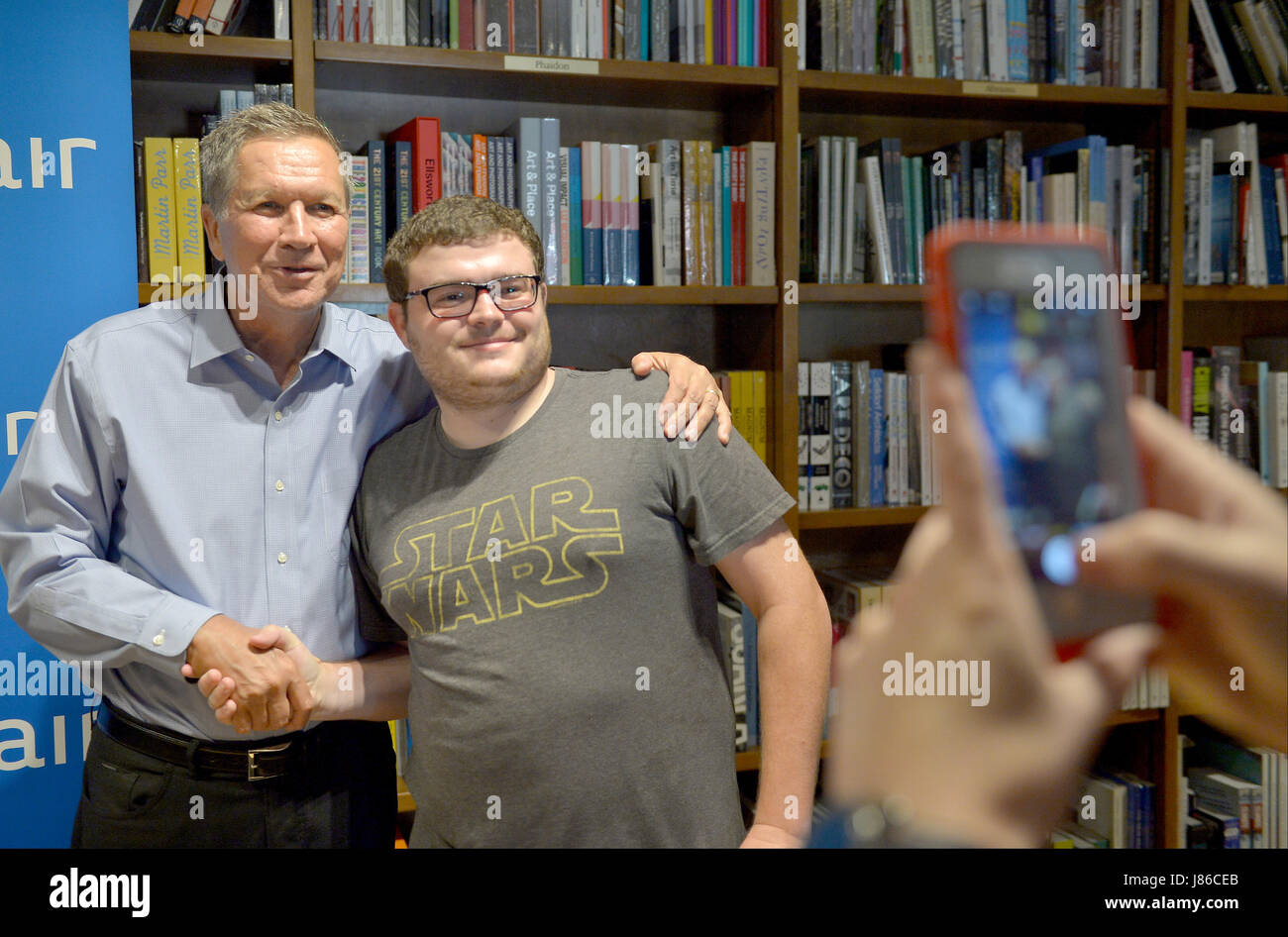 Coral Gables, FL, USA. 26th May, 2017. John Kasich, Governor of Ohio and a former U.S. presidential candidate speaks and sign copies of his new book 'Two Paths: America Divided or United' at Books and Books on May 26, 2017 in Coral Gables, Florida. Credit: Mpi10/Media Punch/Alamy Live News Stock Photo