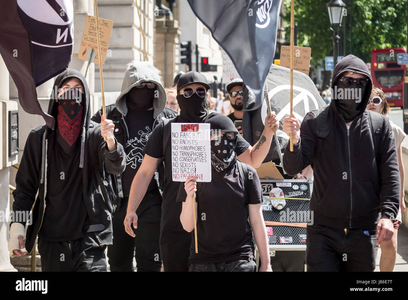 London, UK. 27th May, 2017. A small group of anti-fascists and anarchists march through Whitehall as part of an anti-Tory party protest prior to the upcoming general election. © Guy Corbishley/Alamy Live News Stock Photo